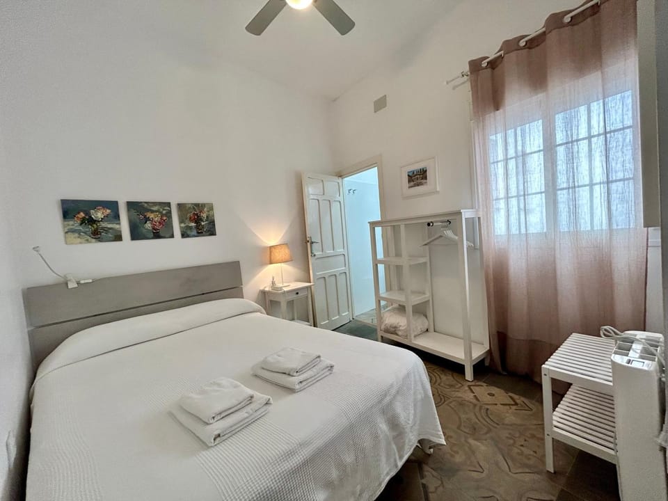 Acogedor apt 8pax 4Bdr 2Bth - CozyHomeSevilla1 Apartment in Seville