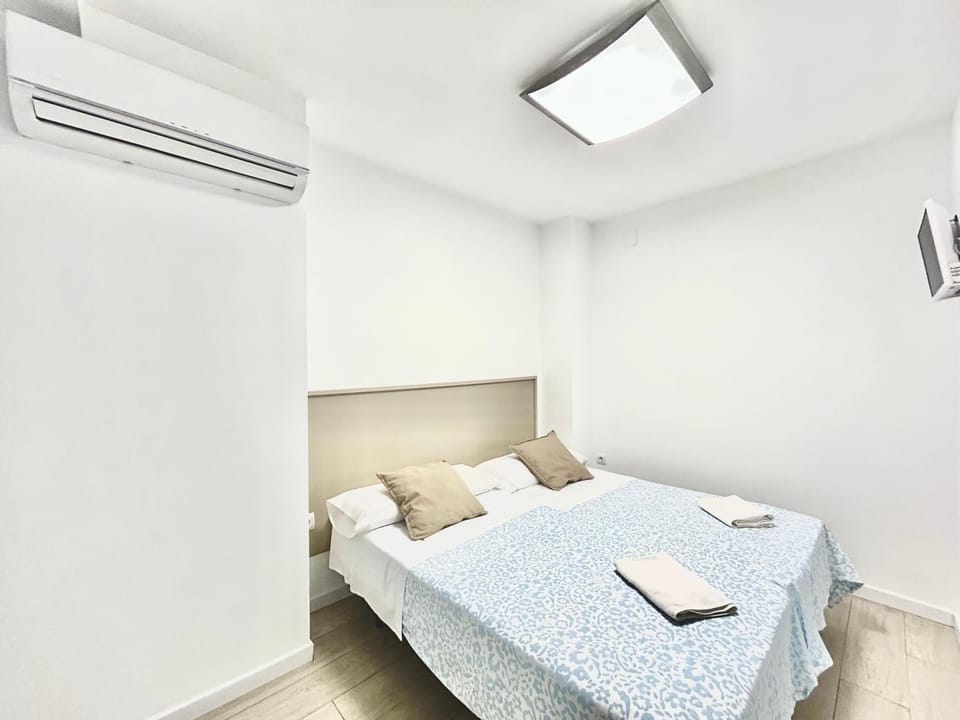 Bed, Photo of the whole room, Bedroom, towels, air conditioner