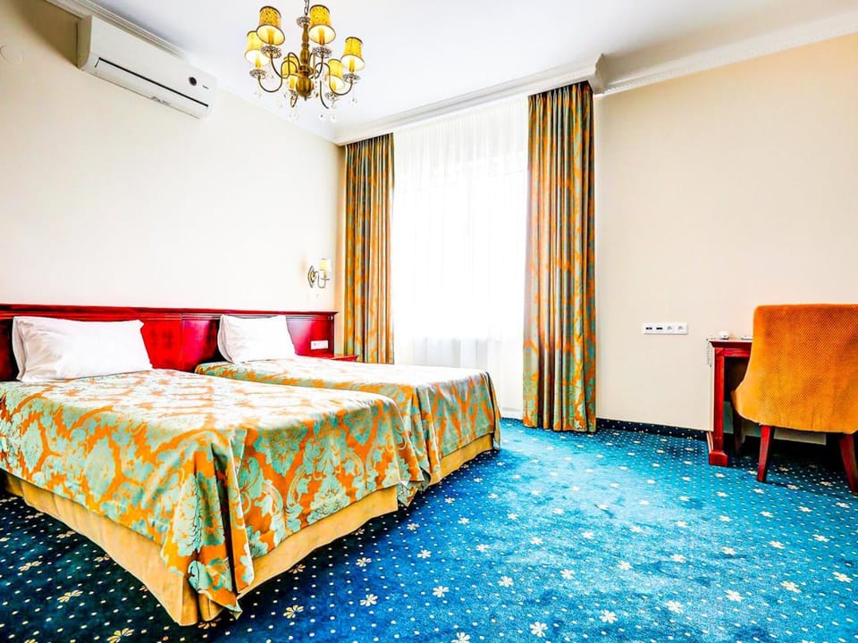 Bed, Coffee/tea facilities, View (from property/room), Living room, Photo of the whole room, Decorative detail, Seating area, Bedroom, Garden view, air conditioner