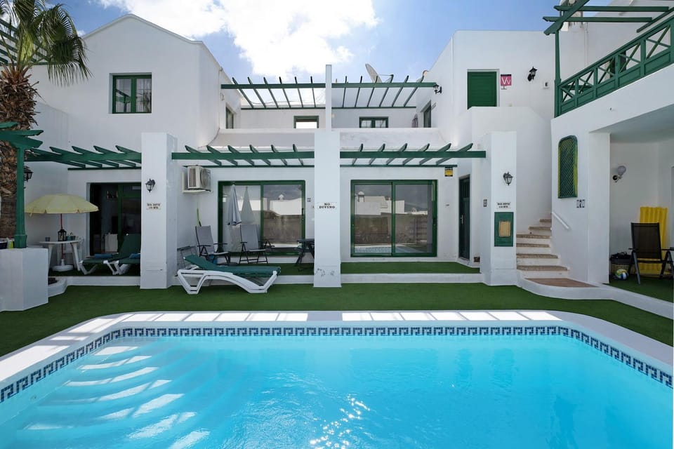 Property building, Living room, Swimming pool