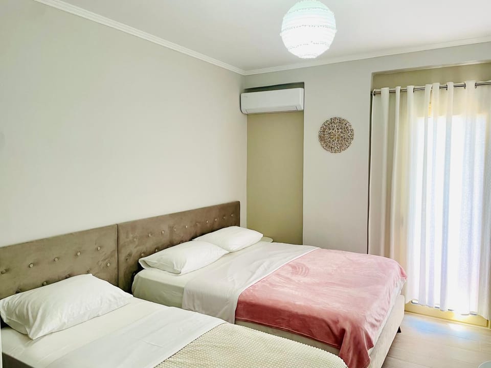 Bed, Photo of the whole room, Bedroom, towels, air conditioner