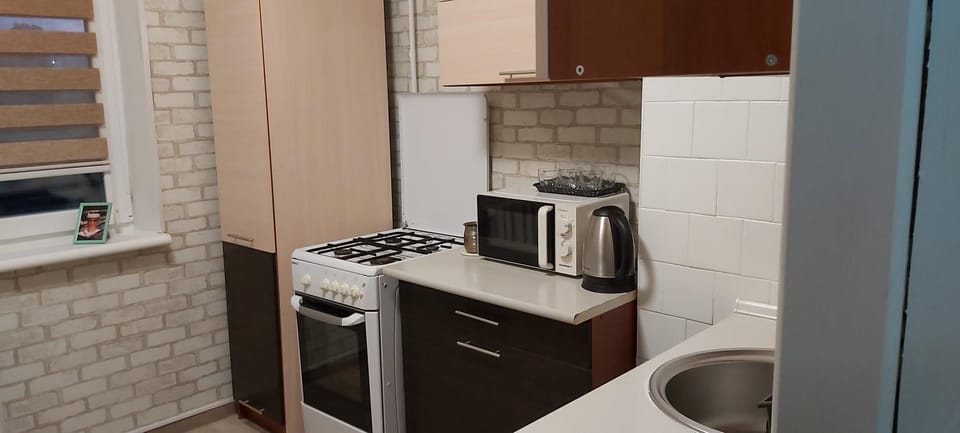 Kitchen or kitchenette, oven, stove