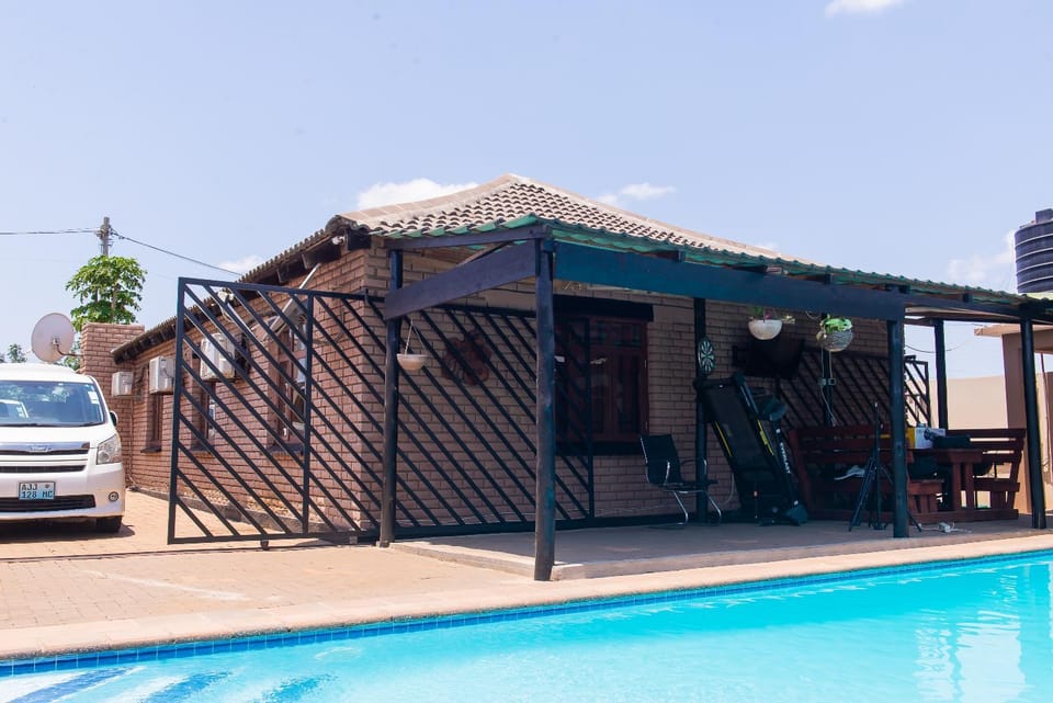 Property building, Patio, Swimming pool