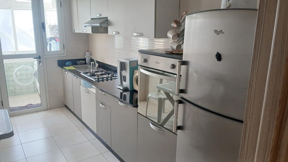 Kitchen or kitchenette, oven