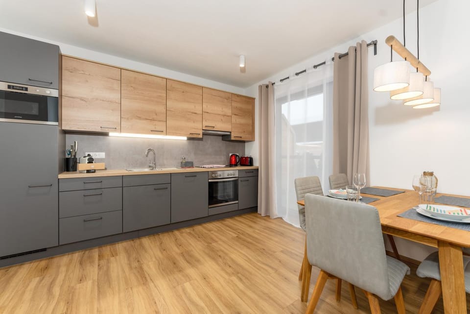 Kitchen or kitchenette, Dining area, dishwasher, oven, stove, toaster