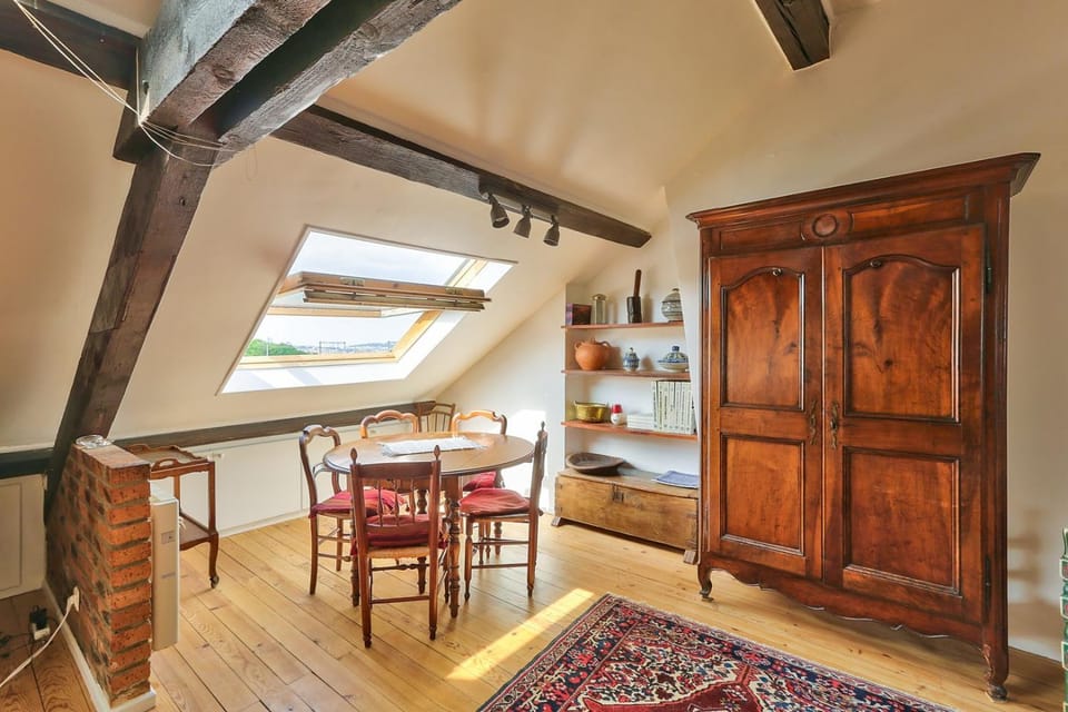 Rustic Bohemian Duplex in Meudon Apartment in Île-de-France