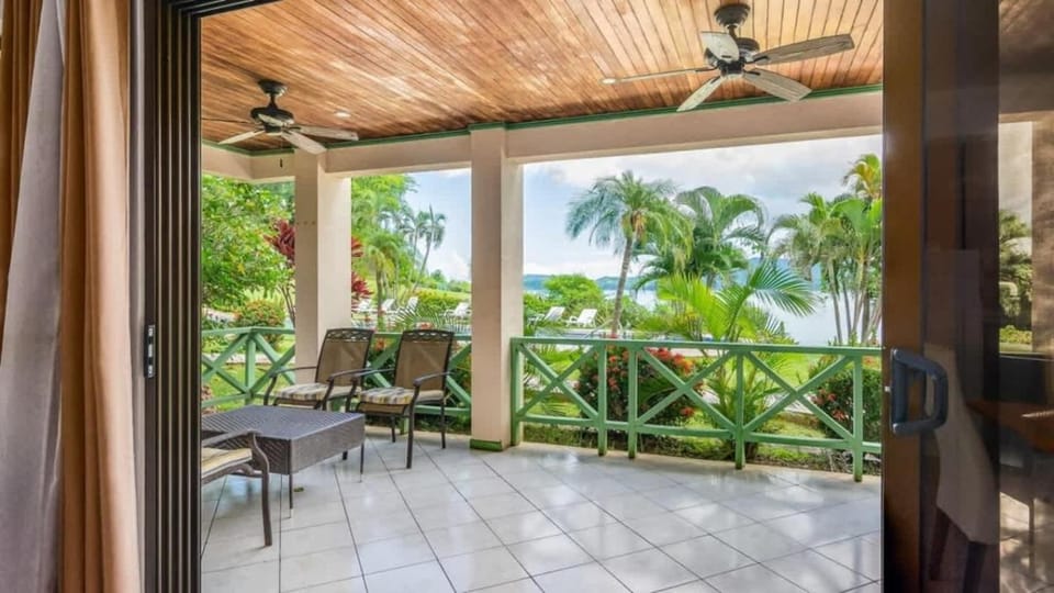 Elegant Condo with Brand-New Fixtures, Shaded Tropical Terrace, and Secluded Beach Access House in Playa Flamingo
