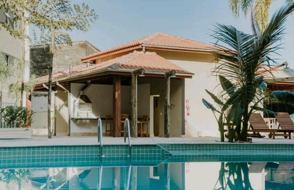 Jardim das Palmeiras II Home Resort JP2 Ubatuba - Apartamento com 2 Dorms, 1 Suíte, Churrasqueira Gourmet, Piscina Adulto e Infantil, Jacuzzi Aquecida, Sauna, Academia, Salão de Jogos e Playground Apartment in Ubatuba