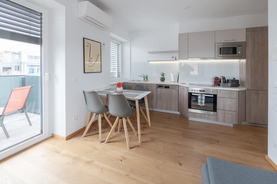 Kitchen or kitchenette, Living room, Seating area, Dining area, dishwasher, oven, toaster