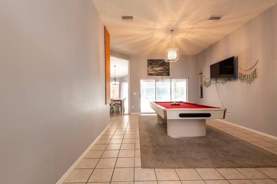 Tropical Escape with Relaxing Heated Pool & Palm Breezes House in Palm Coast