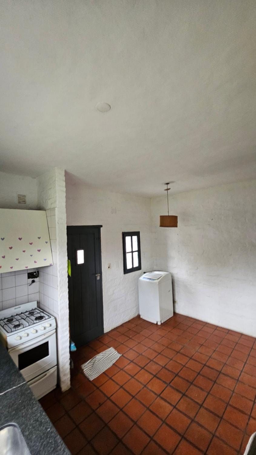 Kitchen or kitchenette, washing machine
