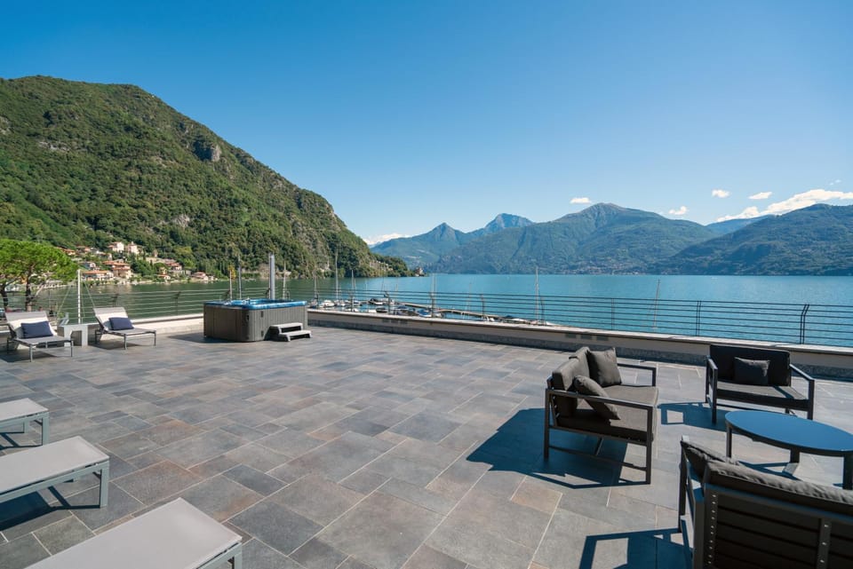 Patio, Natural landscape, Living room, Seating area, Lake view, Mountain view