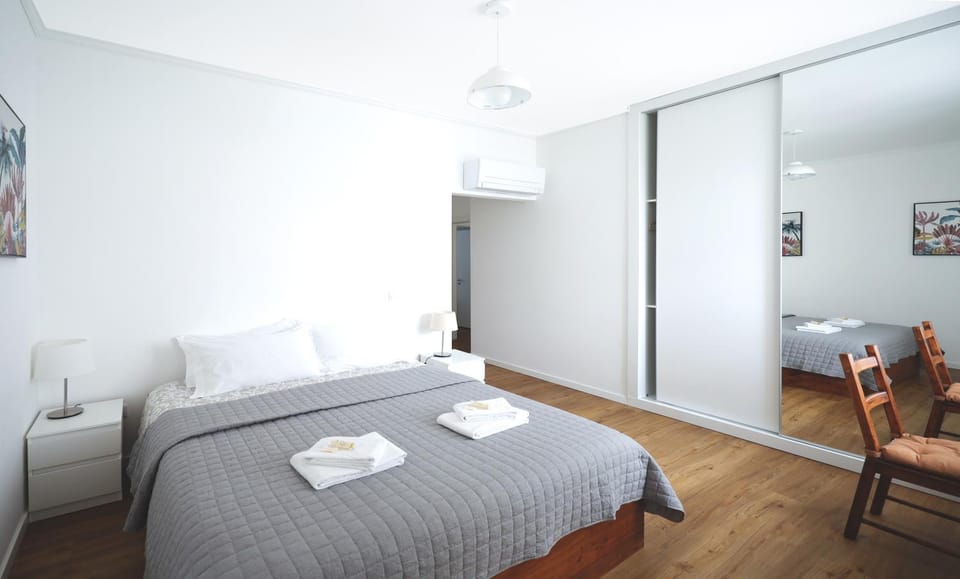 Bed, Seating area, Bedroom, towels, wardrobe