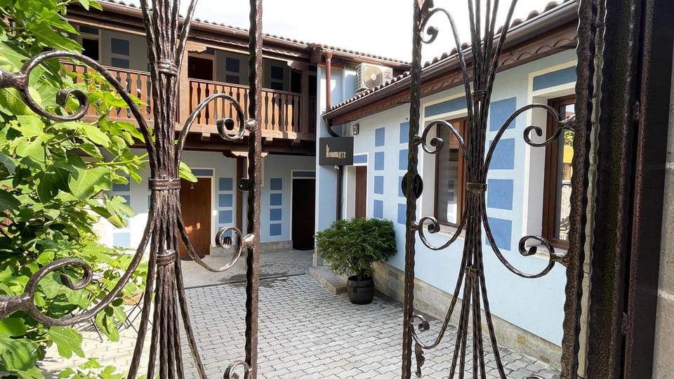 Patio, Facade/entrance, Property logo or sign, Inner courtyard view