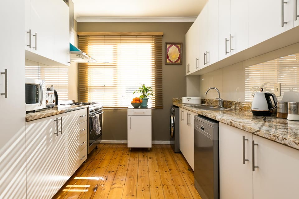 Kitchen or kitchenette, dishwasher, stove, washing machine