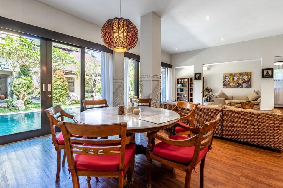 Living room, Seating area, Dining area, Garden view, Pool view