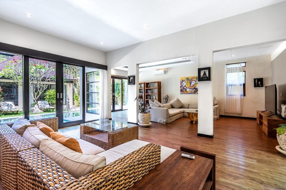 Living room, Seating area, Garden view, Pool view