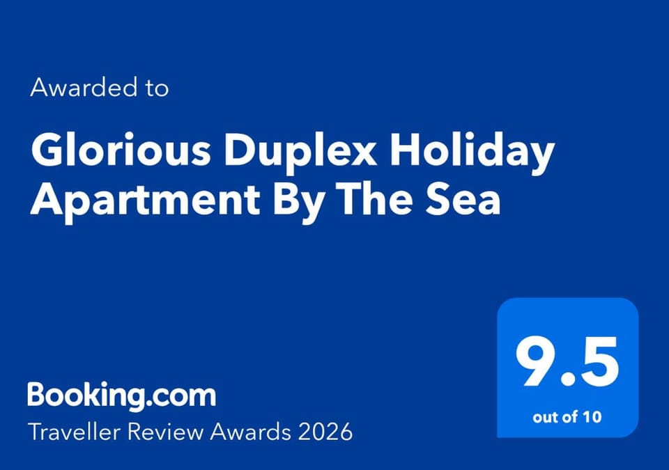 Property building, Property logo or sign, Balcony/Terrace, Logo/Certificate/Sign, Text overlay, Sea view, Sea view, Breakfast, Sunrise, Sunset, Certificate/Award