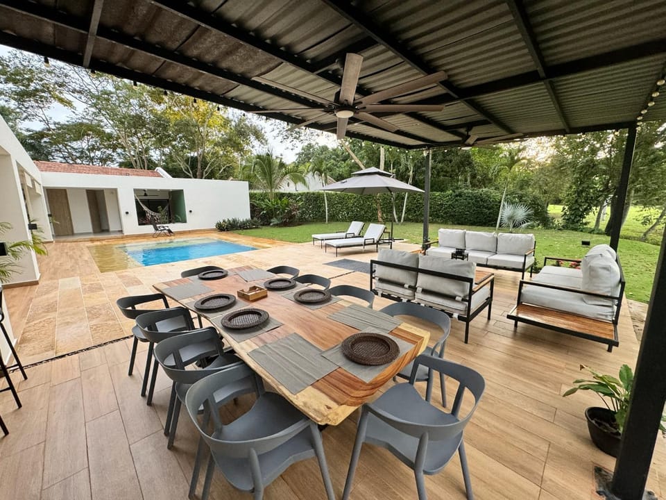 Property building, Patio, BBQ facilities, Garden, View (from property/room), Balcony/Terrace, Living room, Seating area, Dining area, Garden view, Pool view, Swimming pool, sunbed