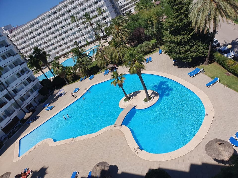 Property building, Living room, Swimming pool