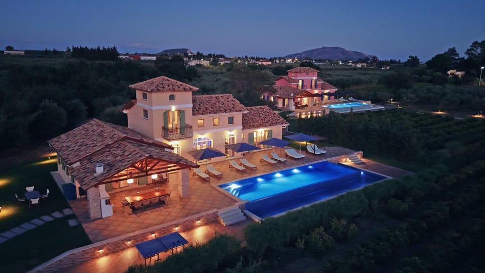 Property building, Night, Natural landscape, Bird's eye view, Swimming pool, Swimming pool, sunbed