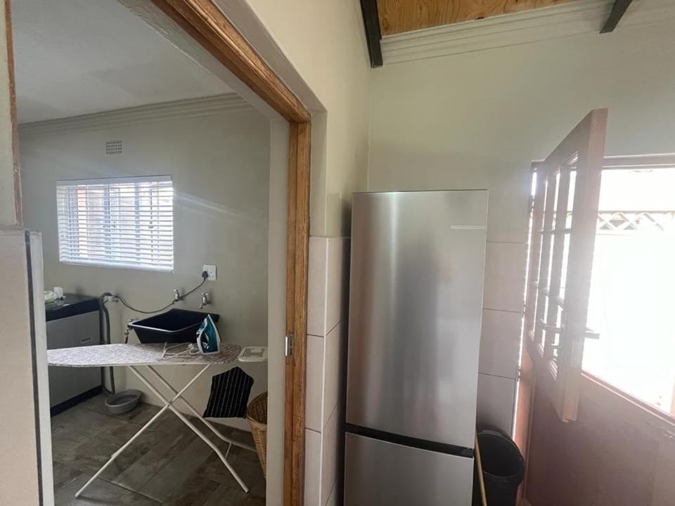 Kitchen or kitchenette, furniture, washing machine