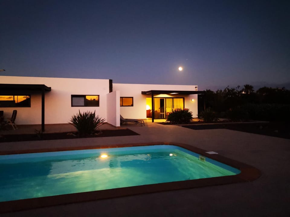 Property building, Swimming pool, Sunset