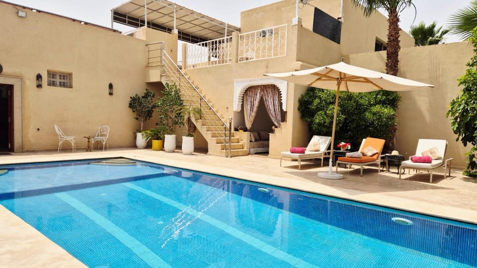 Patio, Day, Pool view, Swimming pool, sunbed