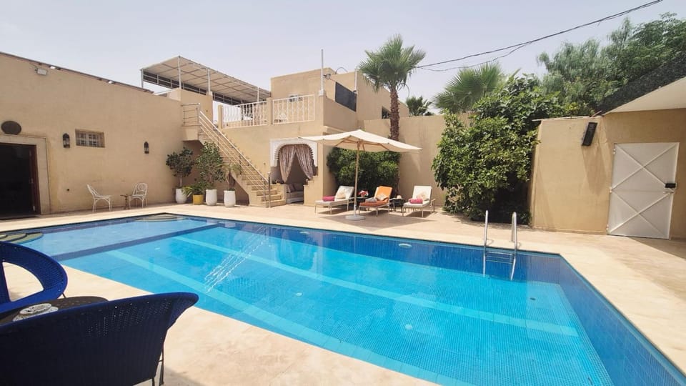 Patio, Day, Pool view, Swimming pool, sunbed