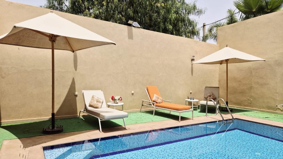 Patio, Day, Pool view, Swimming pool, sunbed