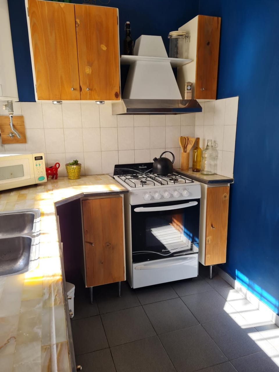 Kitchen or kitchenette, microwave, oven