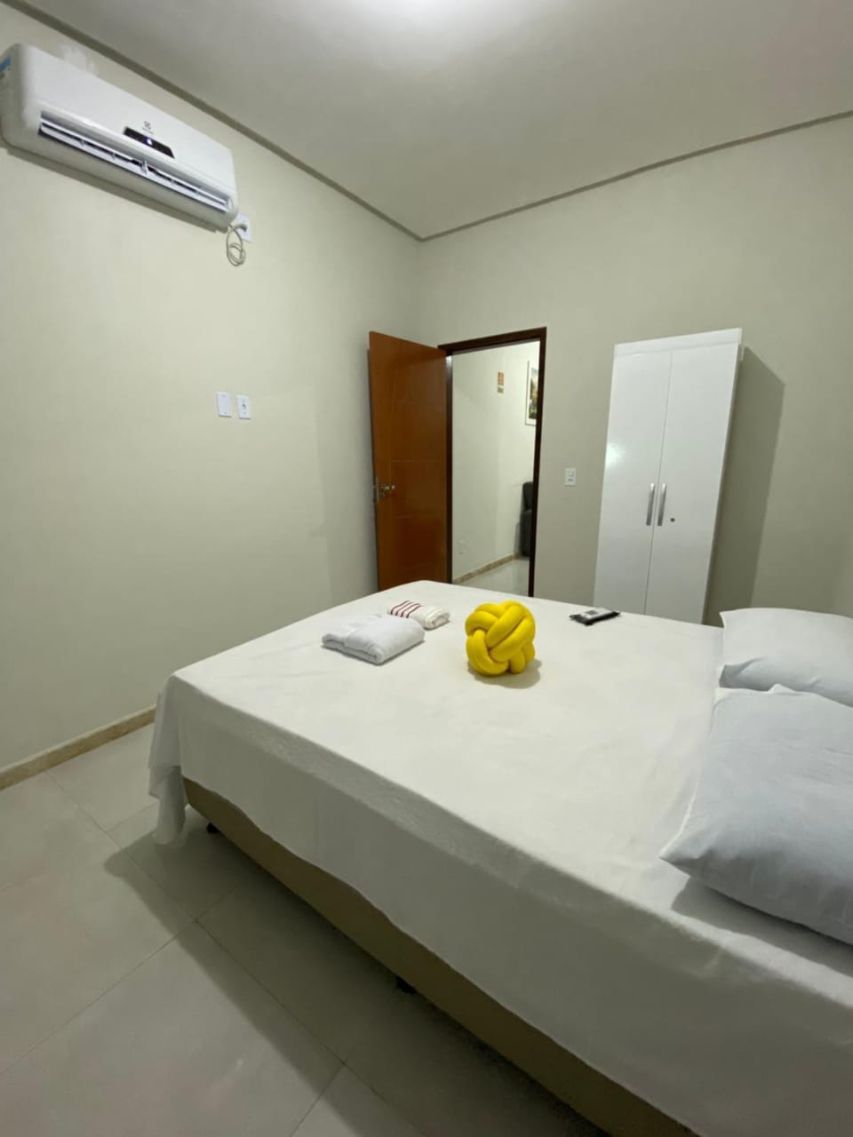 Bed, Bedroom, towels, wardrobe, air conditioner