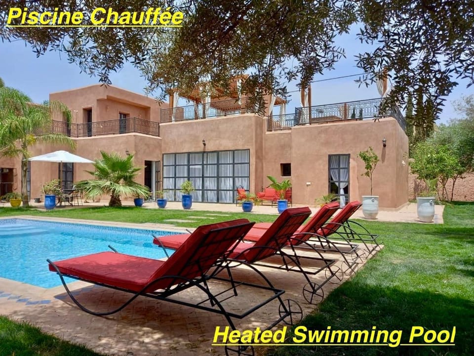 Property building, Day, Pool view, Swimming pool, Swimming pool, sunbed