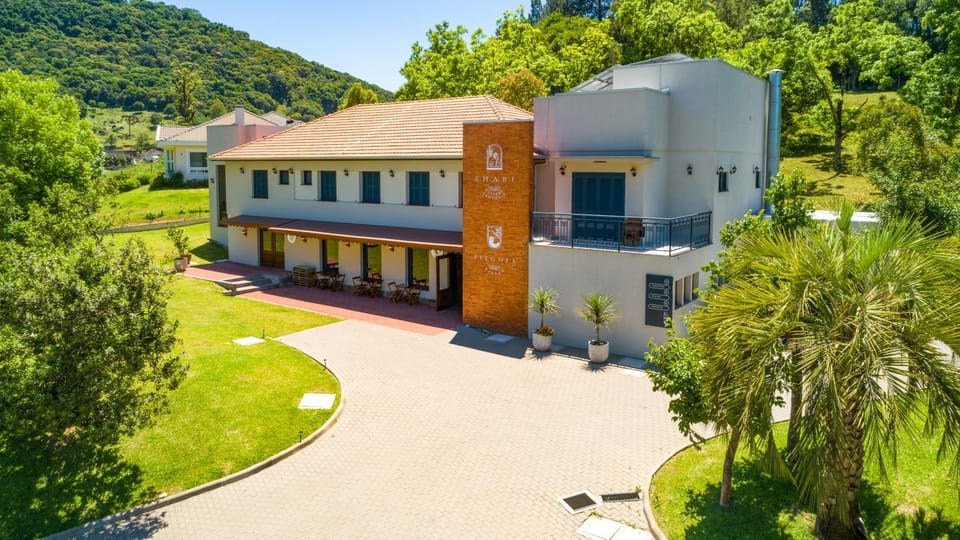 Property building, Restaurant/places to eat, Facade/entrance, Day, Natural landscape, Garden, Garden view, Mountain view