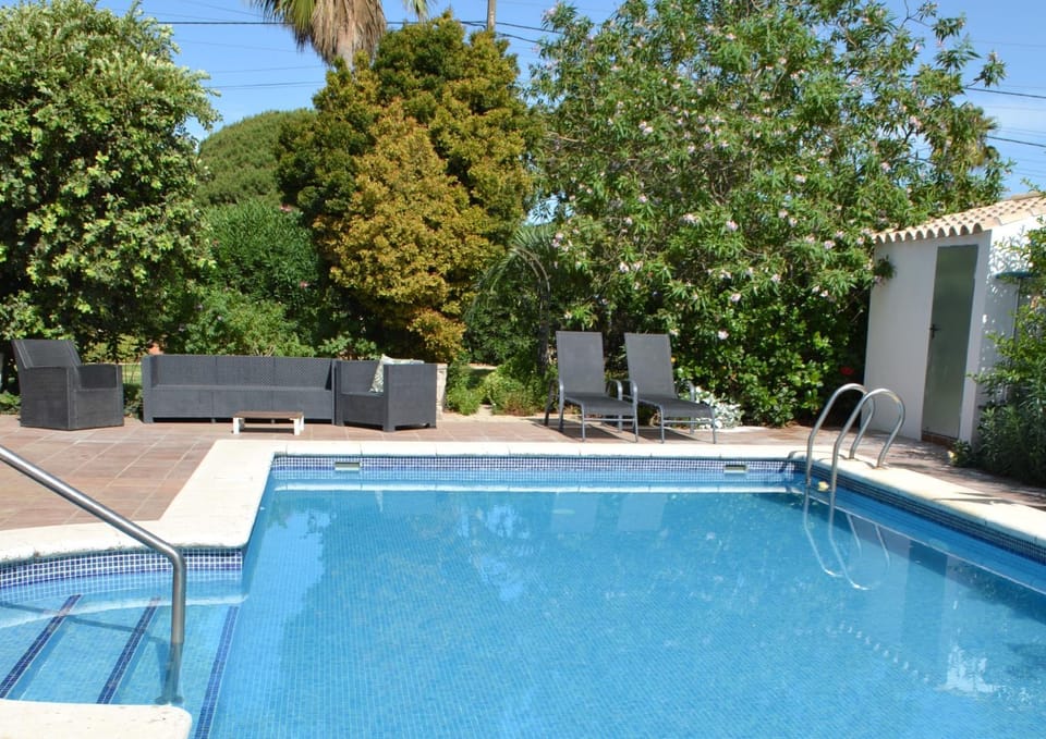 Property building, Living room, Swimming pool