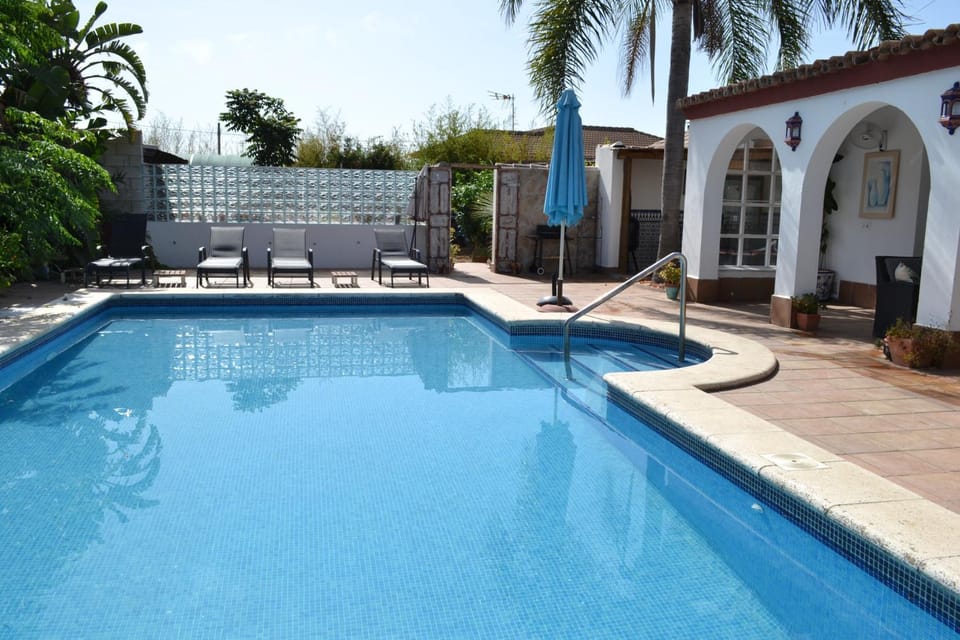 Property building, Living room, Swimming pool