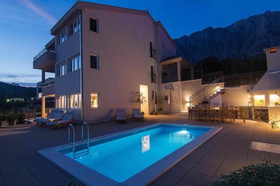 Property building, Patio, Night, Neighbourhood, Mountain view, Pool view, Swimming pool, sunbed