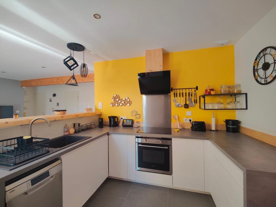 Kitchen or kitchenette, dishwasher, oven, stove, toaster