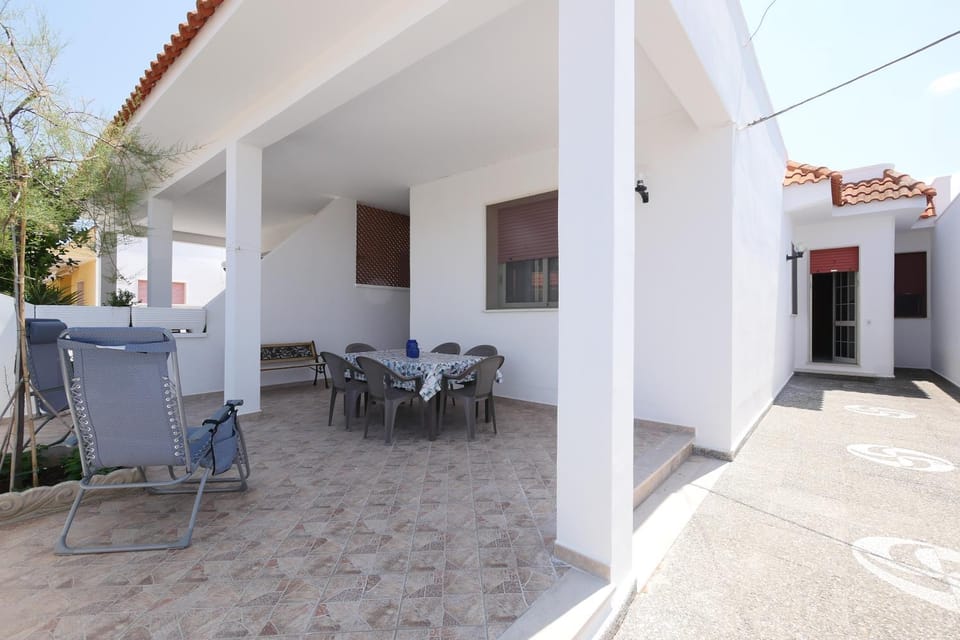 appartamento a 20 metri dalla spiaggia Apartment in Torre Lapillo