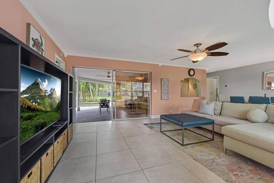 Home wpool by Dream Vacation OP Canal House in Oakland Park