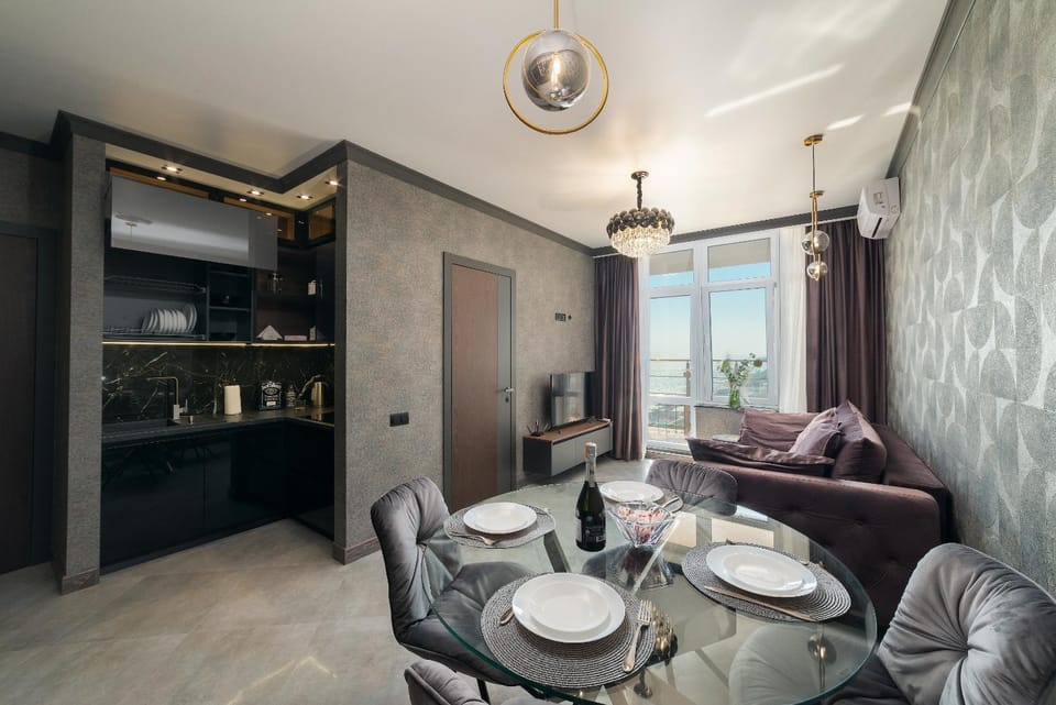Communal lounge/ TV room, TV and multimedia, View (from property/room), Kitchen or kitchenette, Living room, Seating area, Dining area, Communal kitchen, Guests, Guests, Guests, Sea view, kitchen, kitchen, air conditioner