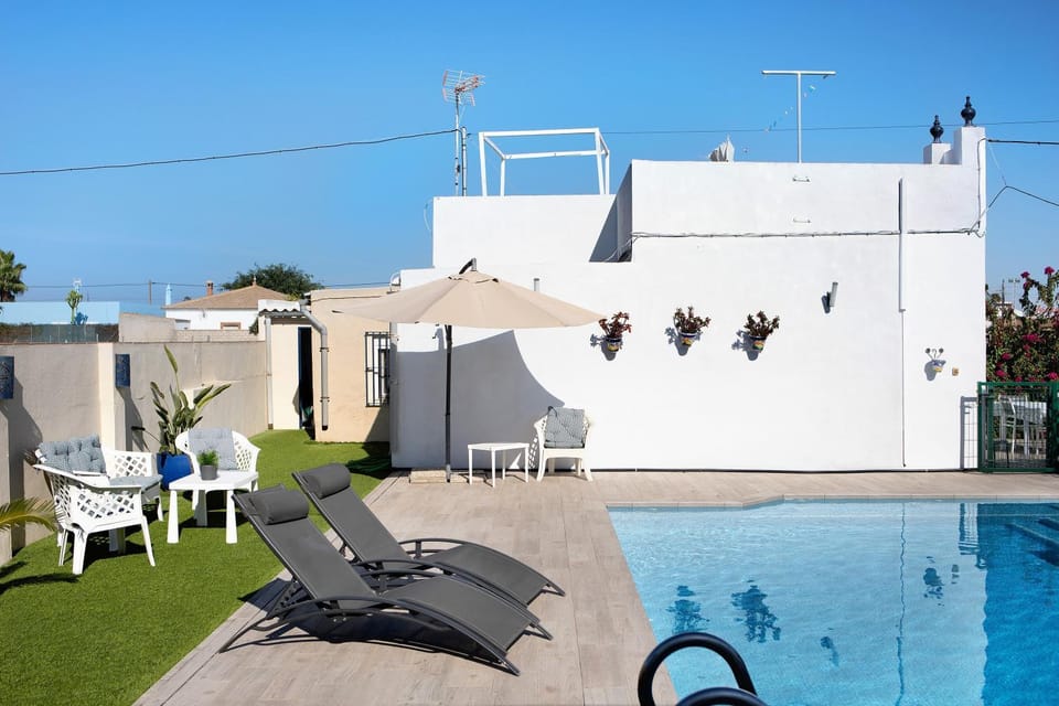 Property building, Living room, Swimming pool