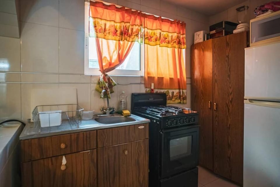 Kitchen or kitchenette, stove