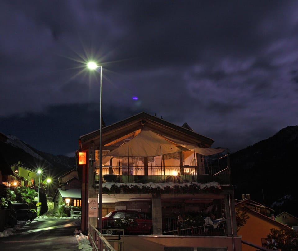 Property building, Facade/entrance, Night, Natural landscape, Balcony/Terrace, Decorative detail, Mountain view