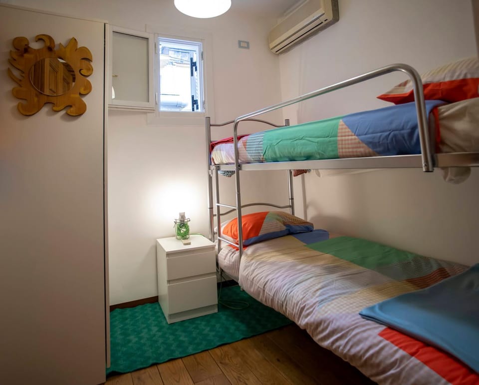 bunk bed, wardrobe, air conditioner