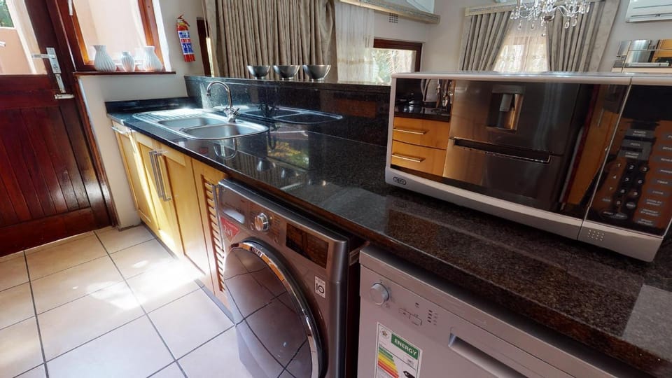 Kitchen or kitchenette, dishwasher, minibar, washing machine, dryer, kitchen