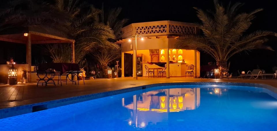 Night, Pool view, Swimming pool, sunbed