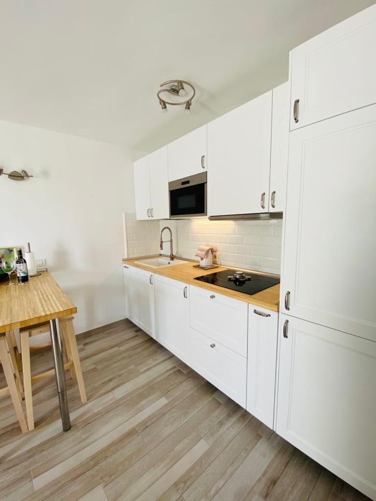 Kitchen or kitchenette, stove, kitchen