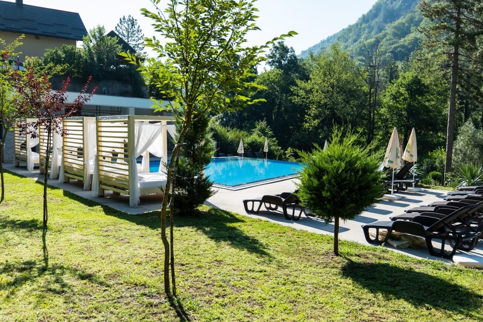 Property building, Day, Natural landscape, Pool view, Swimming pool, sunbed