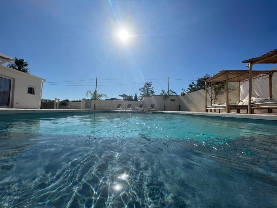 Swimming pool, sunbed